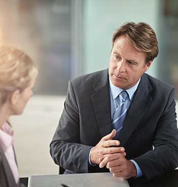 An employee talking to a lawyer