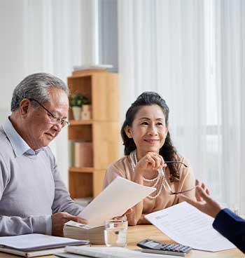 Two asian couple discussing their Estate Planning with a lawyer